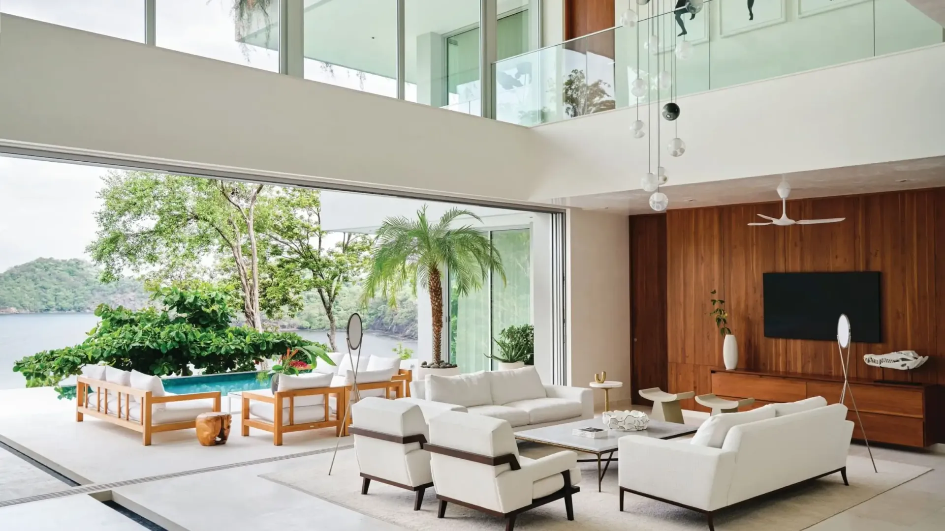 Interior home services Costa Rica — bright clean villa interior with tiled floors and open-plan living area