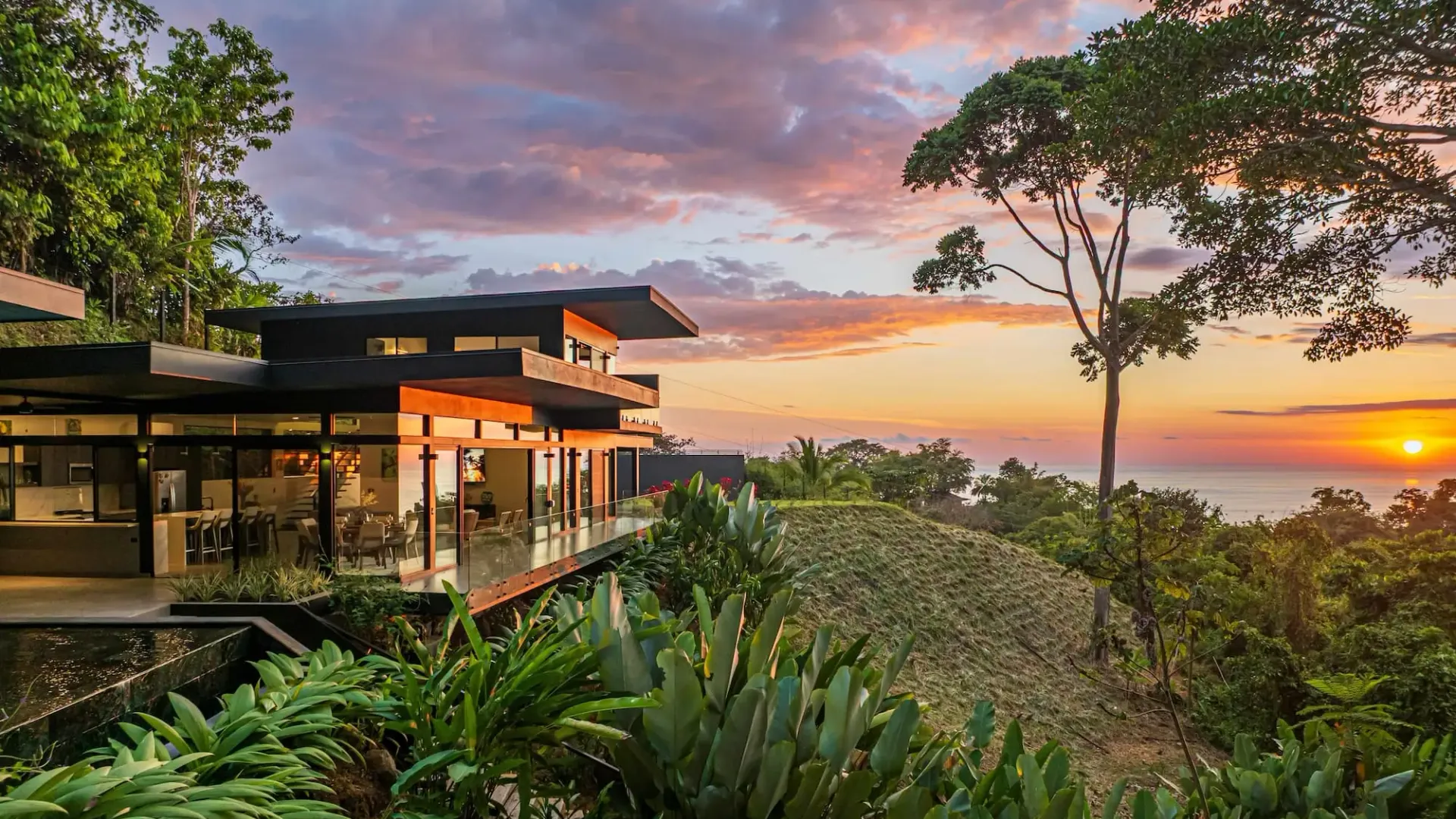 Property maintenance Costa Rica — well-maintained tropical villa with clean exterior and lush garden in Santa Teresa